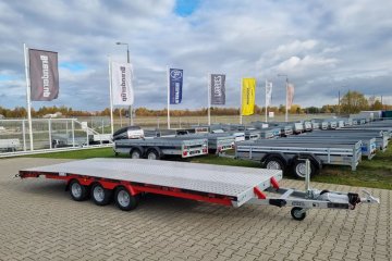 z podłogą aluminiową, malowane boki, lekko ścięty tył, laweta pod busy